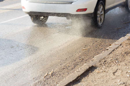 wet asphalt on the roadの写真素材