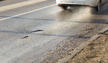 wet asphalt on the roadの写真素材