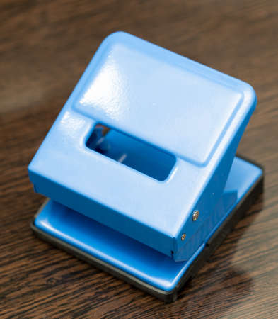office hole punch on the tableの写真素材