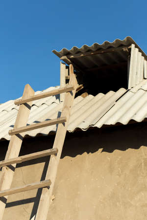 Wooden stairs to the roofの写真素材