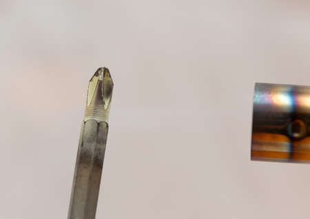 Screwdriver lit under a stream of fireの写真素材