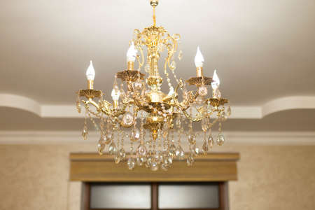 gilded chandelier on the ceilingの写真素材
