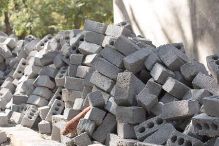 a heap of slag-block bricks for the construction of houses and fencesの写真素材