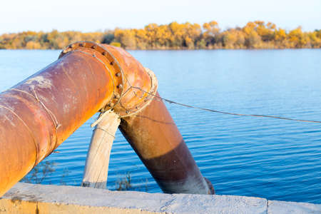 water pump on a riverの写真素材