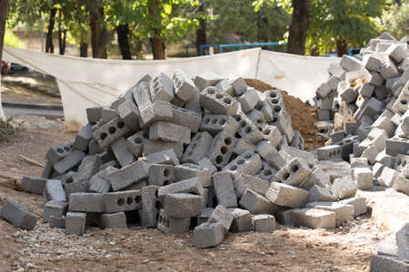a heap of slag-block bricks for the construction of houses and fencesの写真素材