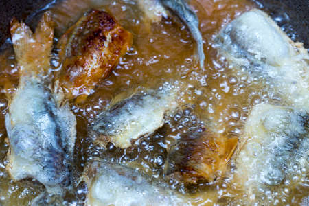 Fried fish in the kitchen