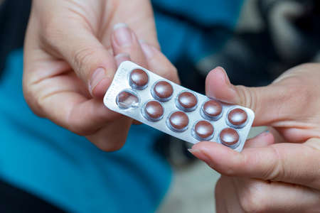 Woman taking pills