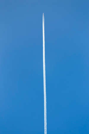 airplane with traces in the sky