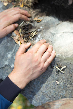 hand climber and stoneの写真素材