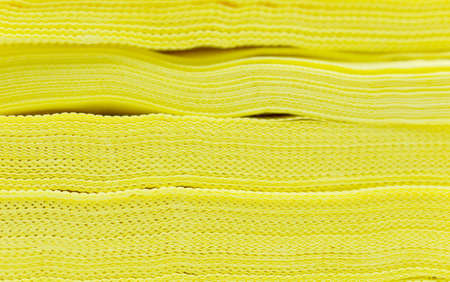 macro background, yellow disposable napkin on the sideの写真素材