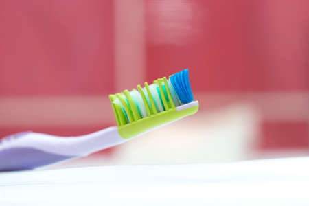 toothbrush in bathroom macroの写真素材
