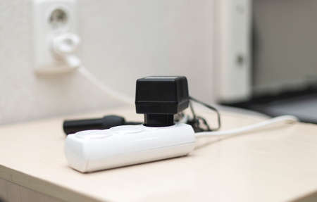 chargers on the tableの写真素材