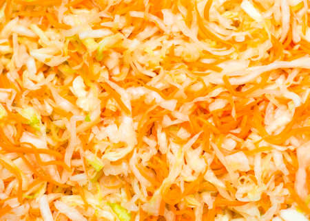background, fresh healthy salad - cabbage and carrotsの写真素材