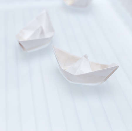 paper boat on water