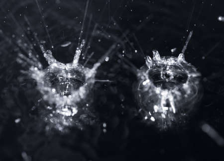 crown formed by a water spray on a black backgroundの写真素材