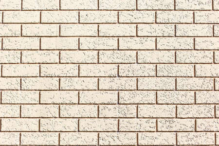 Rough wall texture, wall background, house facade with spatula technology. Close