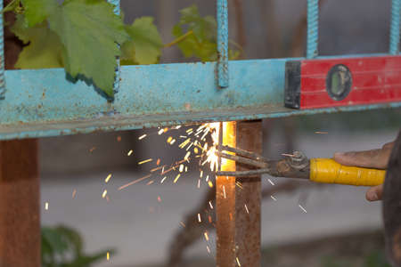 The electric welding process.Arc welding process