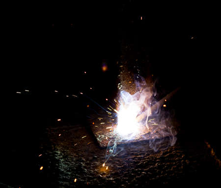 Flash and sparks from electric welding