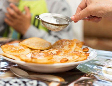 delicious pancakes on a plate for breakfastの写真素材