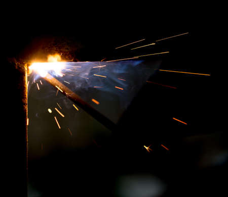 Flash and sparks from electric welding