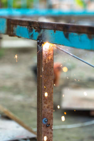 Flash and sparks from electric welding