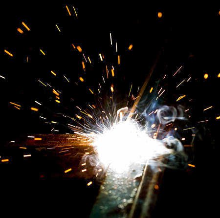 Flash and sparks from electric weldingの写真素材