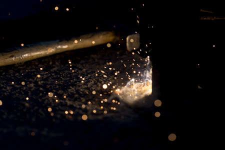 Flash and sparks from electric welding