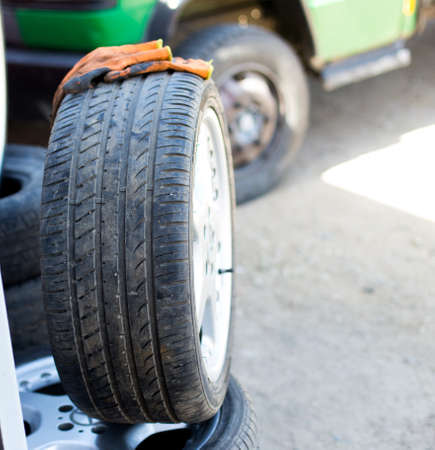 vulcanization, wheel repair and dirty glove on wheelsの写真素材