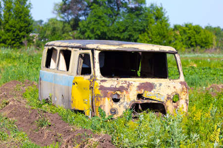 Rusty, old and abandoned vanの写真素材