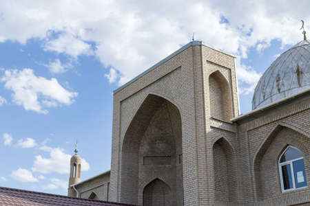 A mosque in Kazakhstan against the blue sky