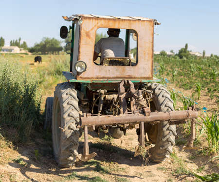 old small tractor in the Portuguese fieldの写真素材