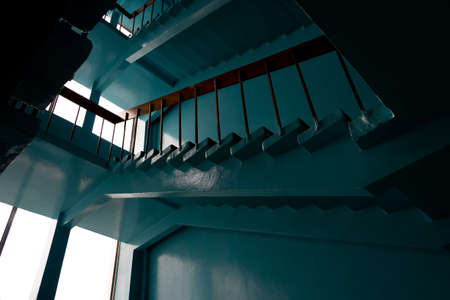 stairs in office building,blue toned image,spiritual concept