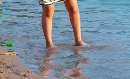 beach, children play and swimの写真素材