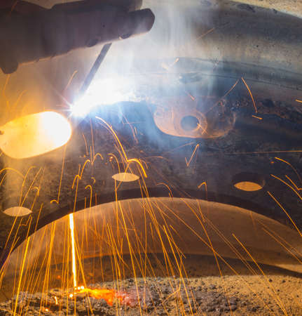 Flash and sparks from electric welding