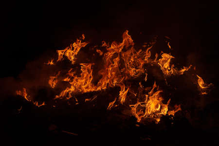 Flame of fire on a black backgroundの写真素材