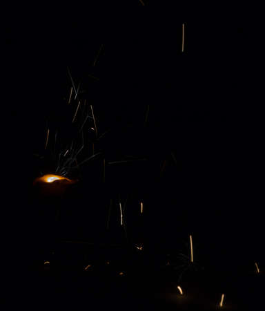 Flash and sparks from electric welding