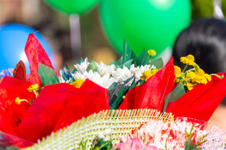 holiday, bouquet of flowers in hands