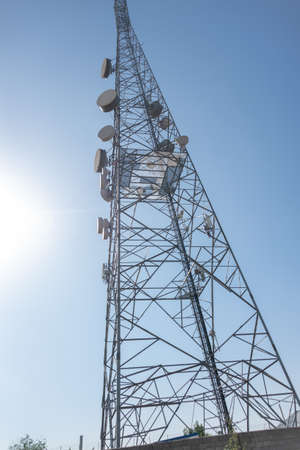 Telecommunication tower with blue sky