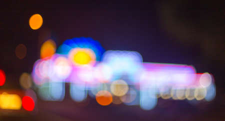 Artistic style - Defocused urban abstract texture ,blurred background with bokeh of city lights from...