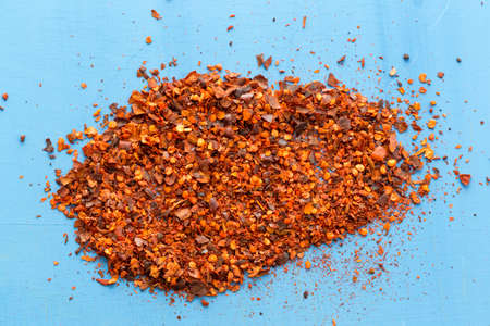 super healthy food selection with extra seasoning powders on a blue background