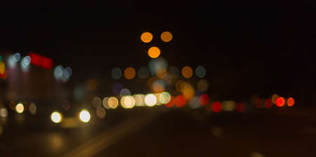 Artistic style - Defocused urban abstract texture ,blurred background with bokeh of city lights from...