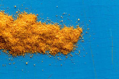 super healthy food selection with extra seasoning powders on a blue backgroundの写真素材