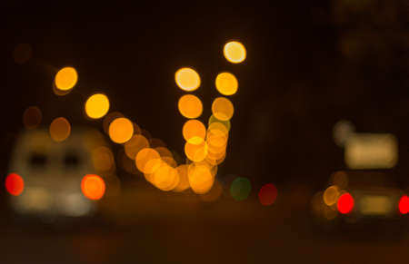 Artistic style - Defocused urban abstract texture ,blurred background with bokeh of city lights from...
