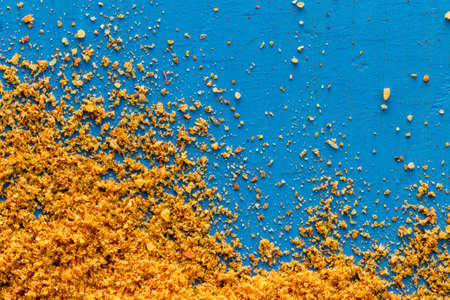 super healthy food selection with extra seasoning powders on a blue background