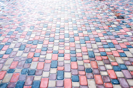 Abstract colorful background of sidewalk tiles - Sidewalk tile as a background for advertisingの写真素材