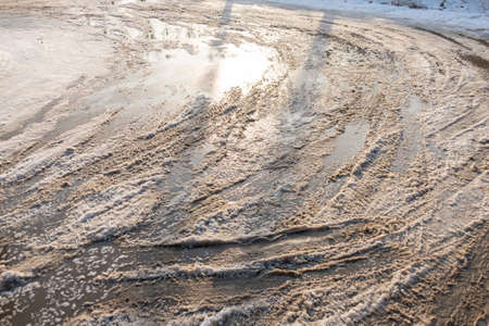 Dirty snowy streets of the city