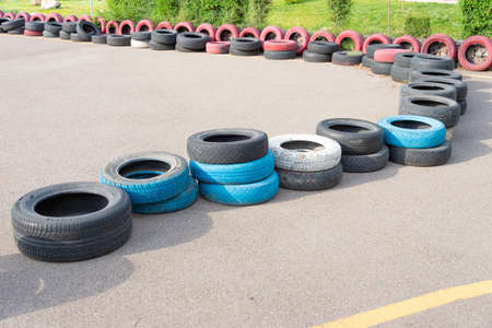 Schumacher kartodrom many multi-colored car wheelsの写真素材