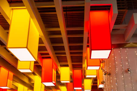 Square colored lamps on the ceilingの写真素材