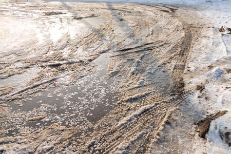 Dirty snowy streets of the cityの写真素材