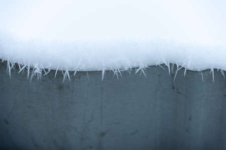 Winter snow on the roofの写真素材